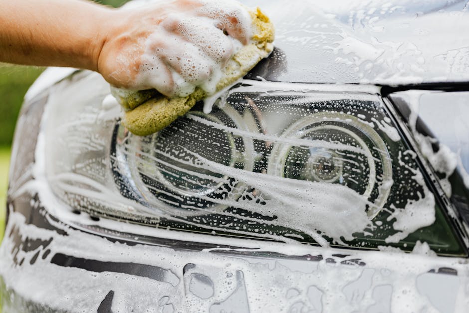 Soapy car exterior during a thorough hand car wash